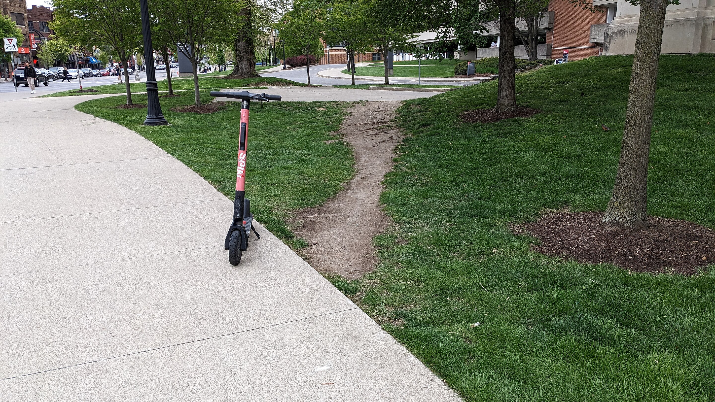 A desire path between concrete sidewalks at The Ohio State University